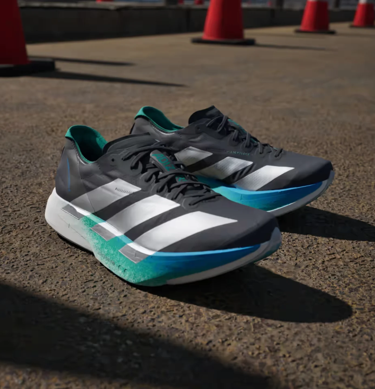 adidas Black Running Shoes with Silver Stripes and Blue-Green Sole