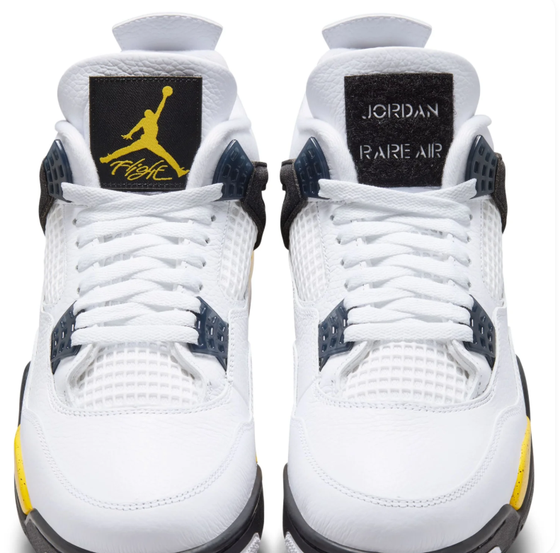 Air Jordan White Sneakers with Yellow Speckled Midsole and Black Accents