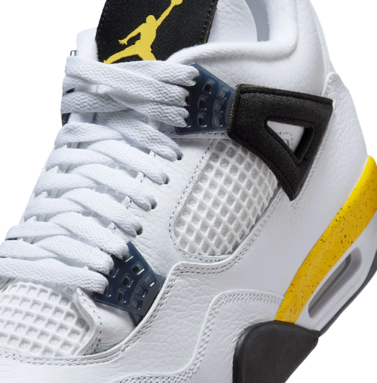 Air Jordan White Sneakers with Yellow Speckled Midsole and Black Accents