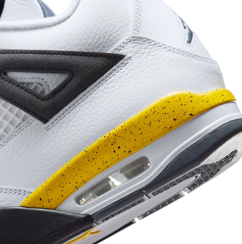 Air Jordan White Sneakers with Yellow Speckled Midsole and Black Accents