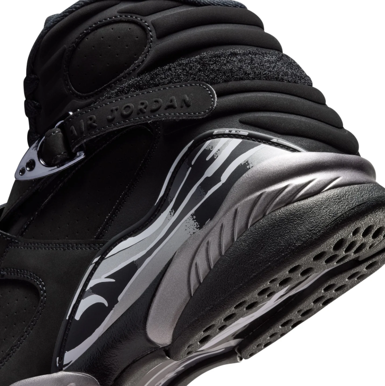 Air Jordan Black High-Top Sneakers with Cross Straps and Silver Accents