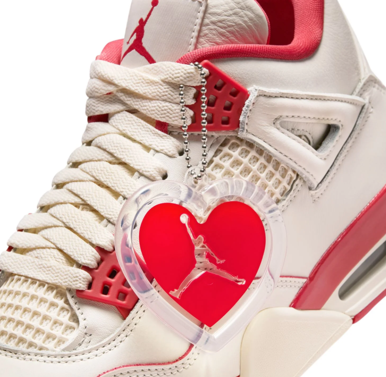 Air Jordan Cream Sneakers with Red Accents and Grid Panels