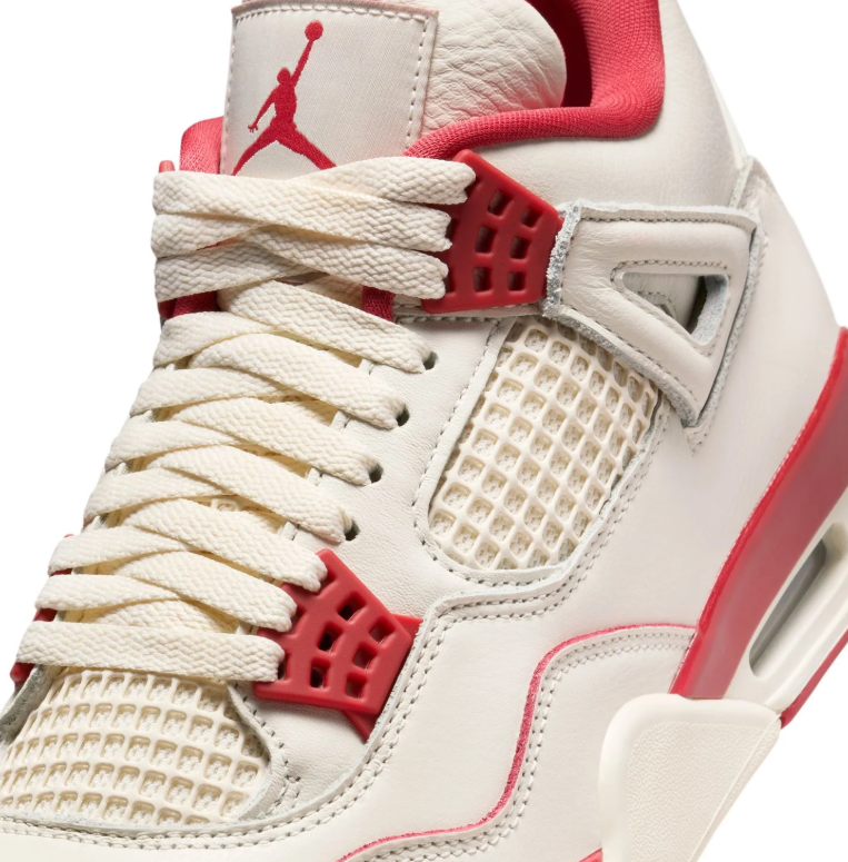 Air Jordan Cream Sneakers with Red Accents and Grid Panels