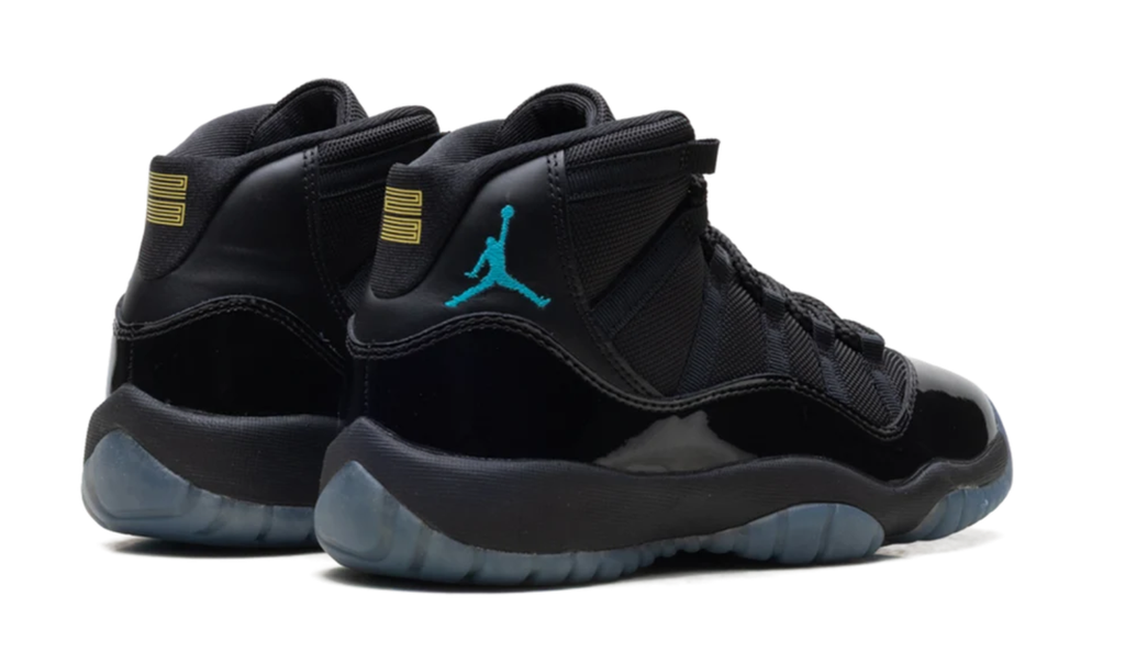Air Jordan Black High-Top Sneakers with Glossy Trim and Teal Accents