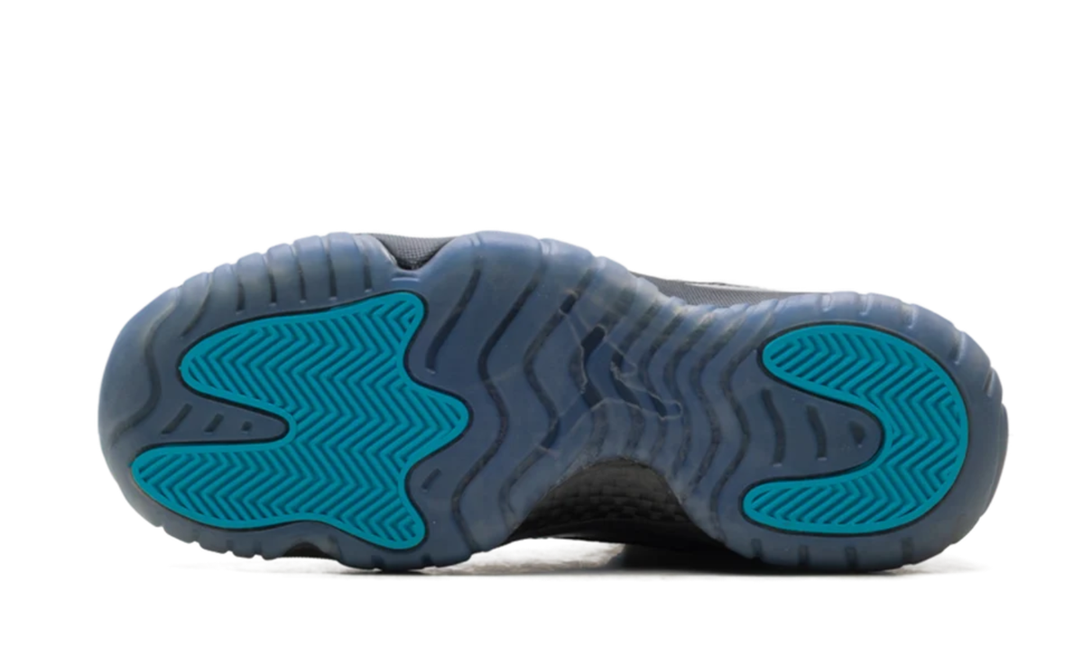 Air Jordan Black High-Top Sneakers with Glossy Trim and Teal Accents