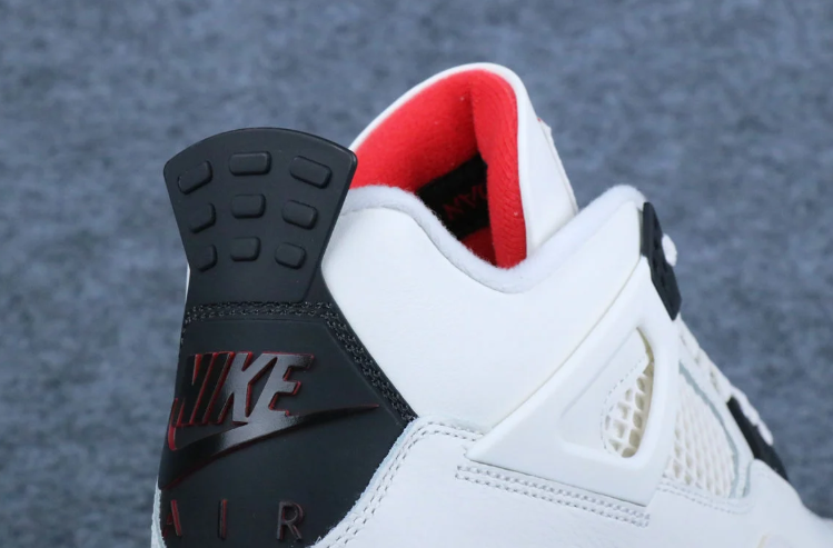 Air Jordan White and Black Sneakers with Red Flight Club Detailing