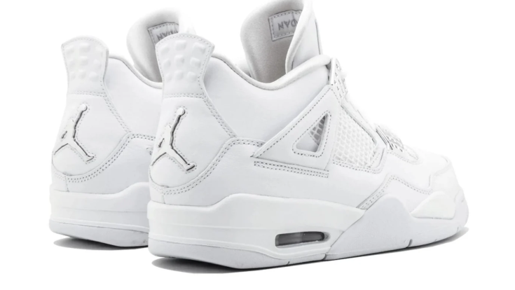 Air Jordan White Sneakers with Metallic Silver Lace Accents