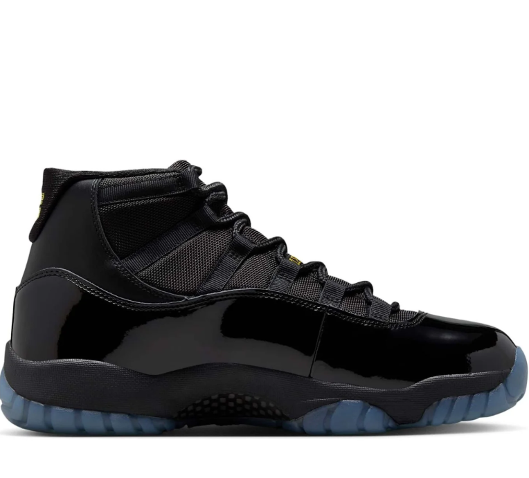 Air Jordan Black High-Top Sneakers with Glossy Trim and Teal Outsole Details