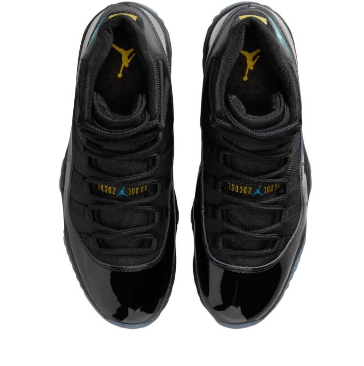 Air Jordan Black High-Top Sneakers with Glossy Trim and Teal Outsole Details