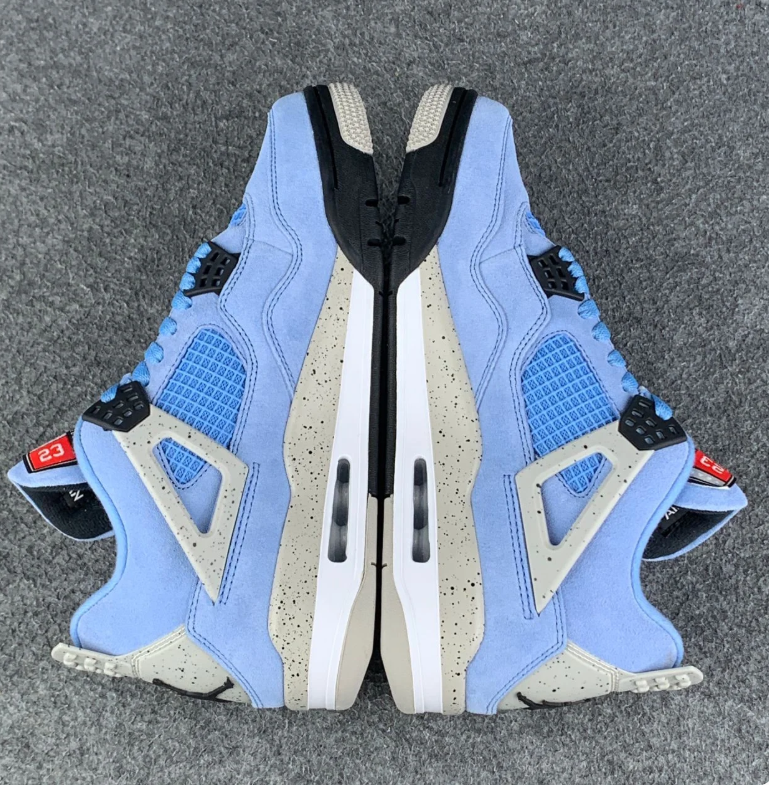 Air Jordan 4 Blue Sneakers with Speckled Gray and Black Accents
