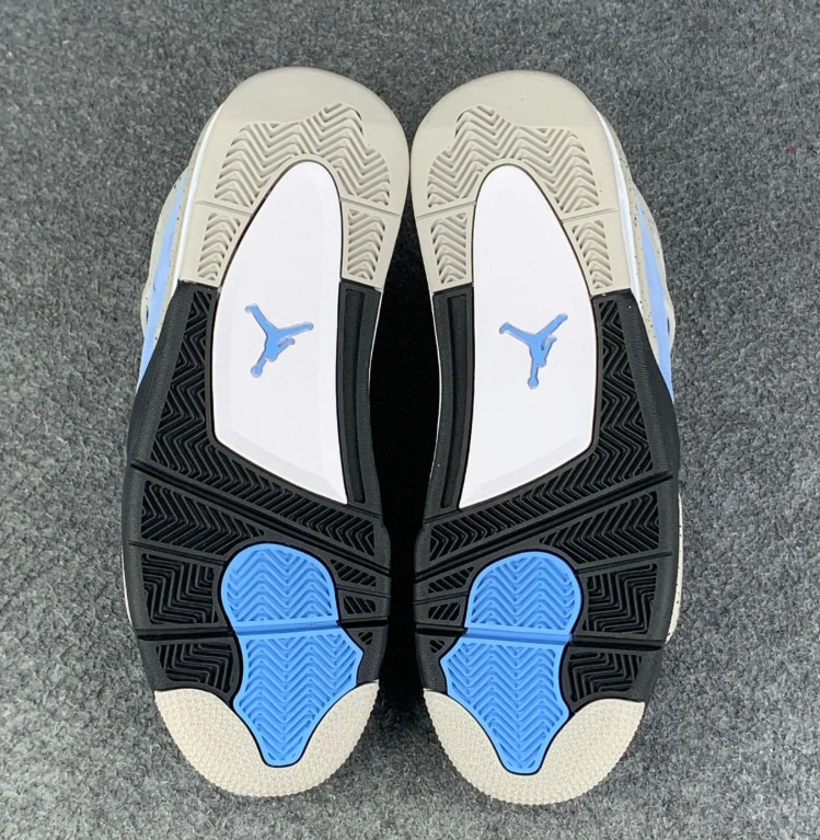 Air Jordan 4 Blue Sneakers with Speckled Gray and Black Accents