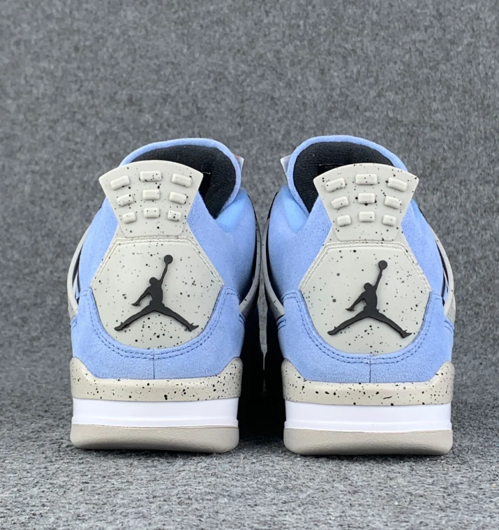 Air Jordan 4 Blue Sneakers with Speckled Gray and Black Accents
