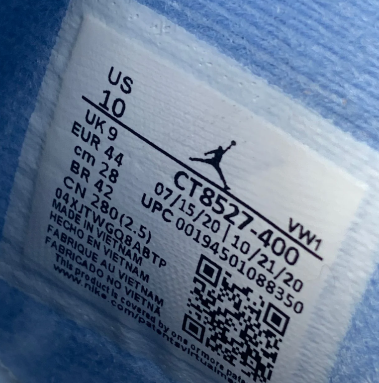 Air Jordan 4 Blue Sneakers with Speckled Gray and Black Accents