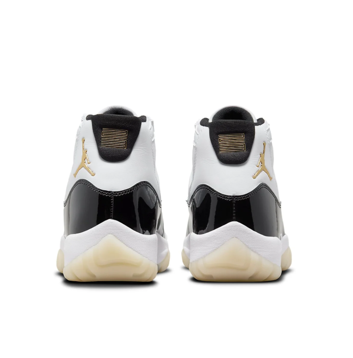 Air Jordan White and Black High-Top Sneakers with Gold Accents