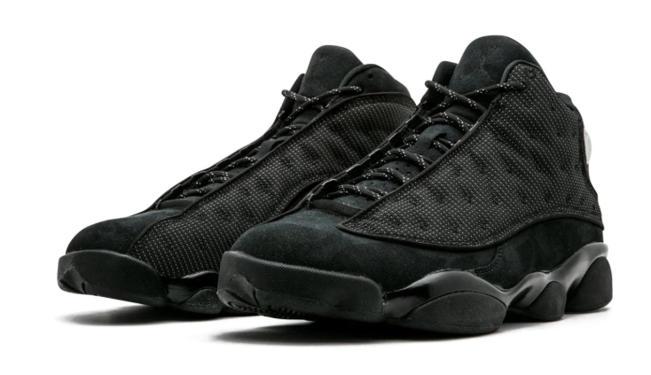 Air Jordan Black High-Top Sneakers with Textured Panels and Green Accents