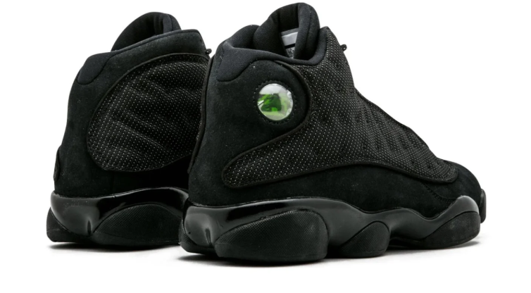 Air Jordan Black High-Top Sneakers with Textured Panels and Green Accents
