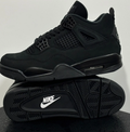 Air Jordan All-Black Sneakers with Grid Panels and Nike Air Heel Detailing