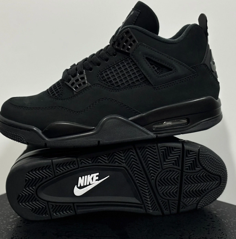 Air Jordan All-Black Sneakers with Grid Panels and Nike Air Heel Detailing