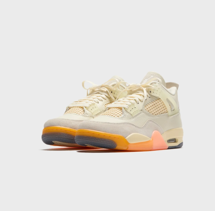 Air Jordan Cream Sneakers with Peach and Orange Sole Accents