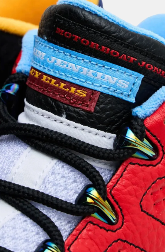 Air Jordan Mismatched Red and Black Sneakers with Multicolor Accents