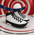 Air Jordan White and Black High-Top Sneakers with Red Heel Details