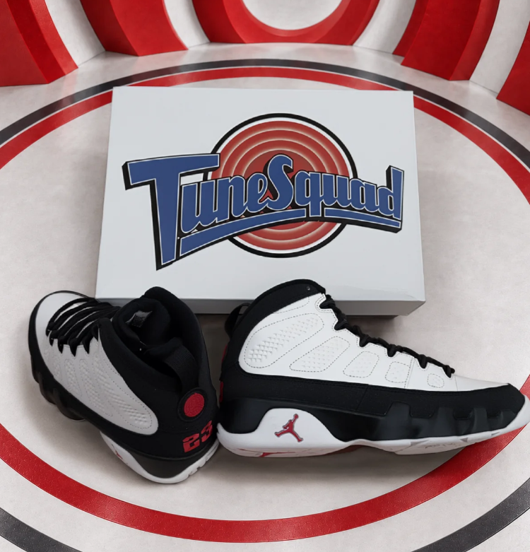 Air Jordan White and Black High-Top Sneakers with Red Heel Details