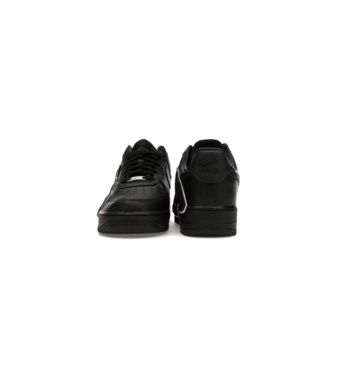 Black Low-Top Sneakers with White-Outlined AIR Lettering