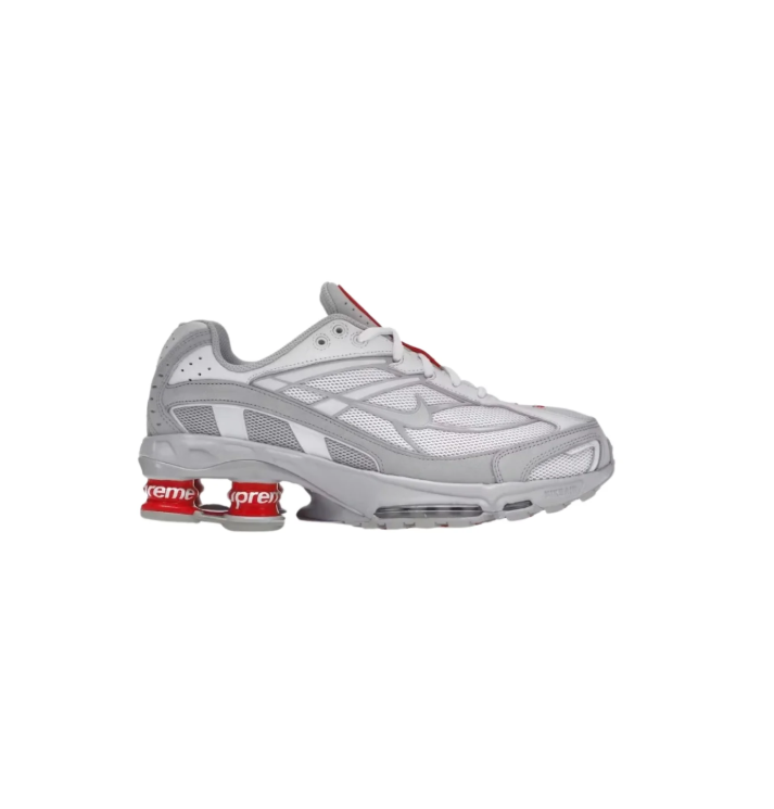 Nike Gray and White Sneakers with Red Supreme Heel Detailing