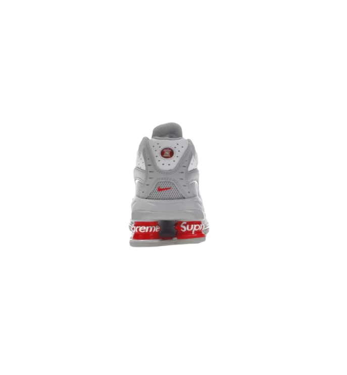 Nike Gray and White Sneakers with Red Supreme Heel Detailing