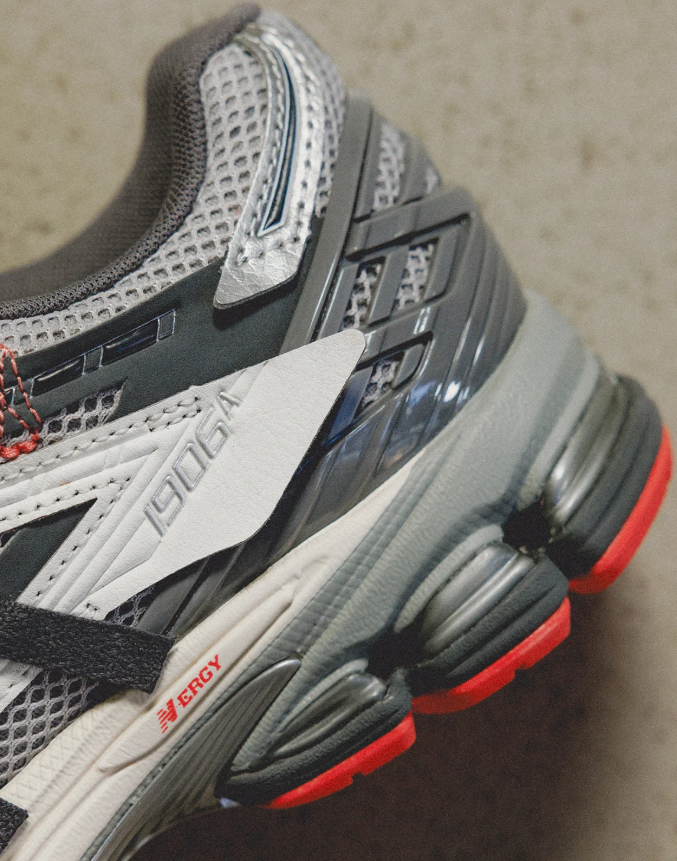 New Balance 1906R Gray and Silver Sneakers with Coral Red Outsole